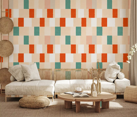 Terracotta and sage rectangles form a relaxed grid across this living room wallpaper