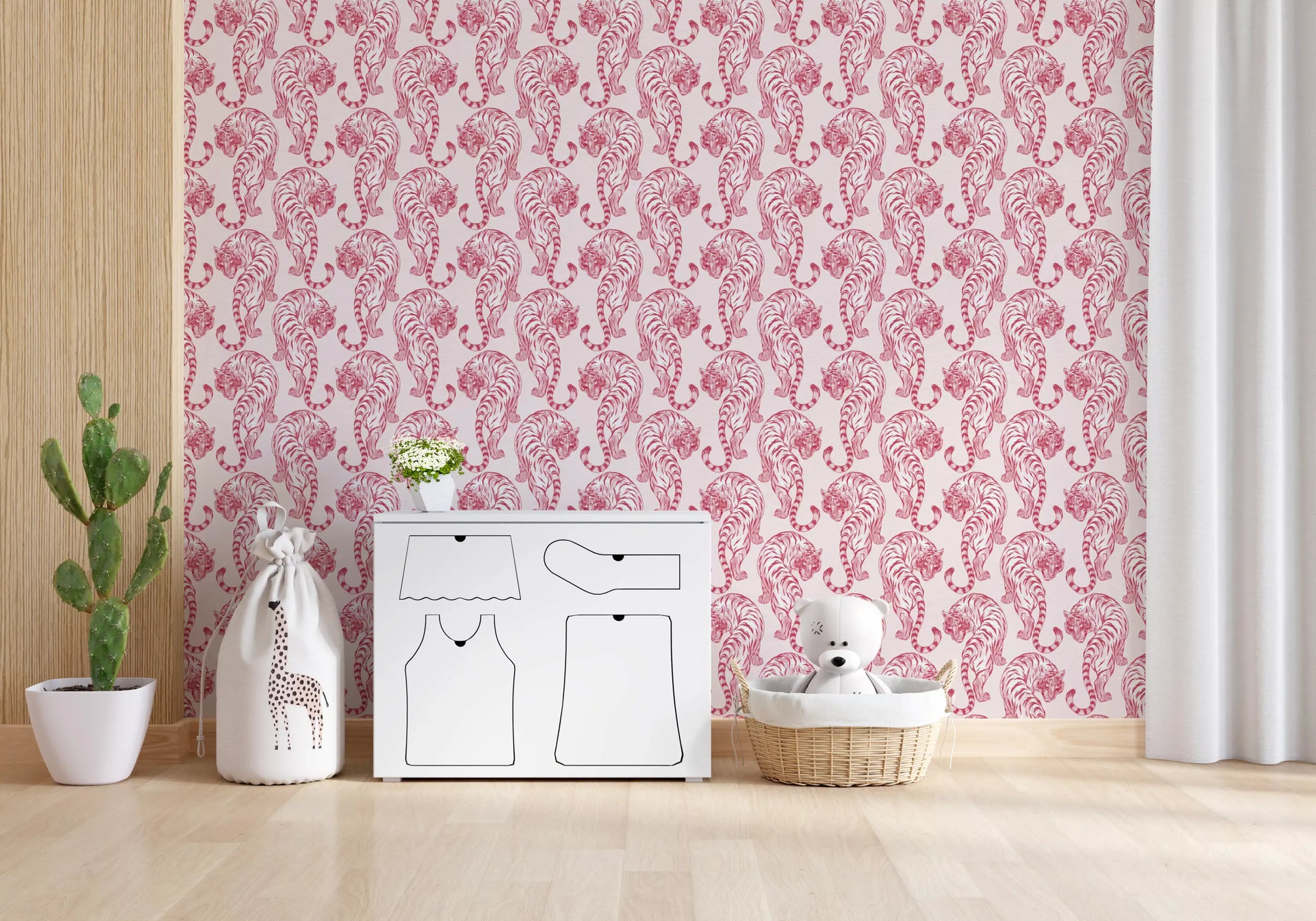 This chinoiserie wallpaper places crimson tigers across a living room in blush pink.