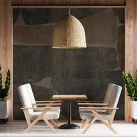Charcoal stone slab wall mural grounding a modern living room, GD10811
