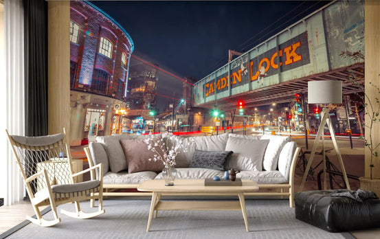 Neon Camden bridge wall mural glowing over a living room after dark GD11186
