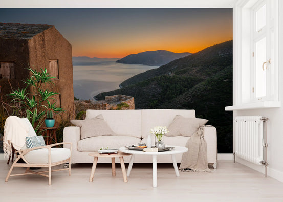 Living room set with a rustic stone retreat wall mural, Golden Hour scene GD11469