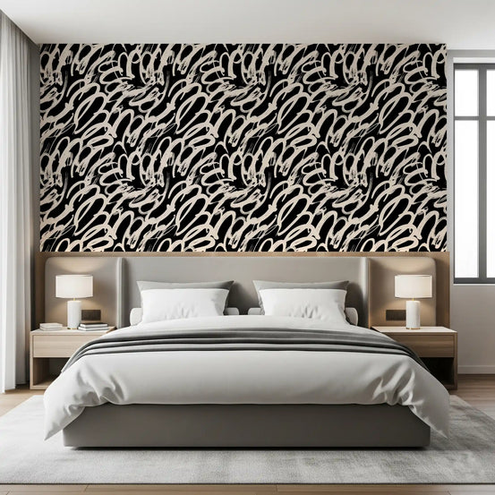 Ivory strokes loop across a bedroom feature in Monochrome Swirl wallpaper GD11684
