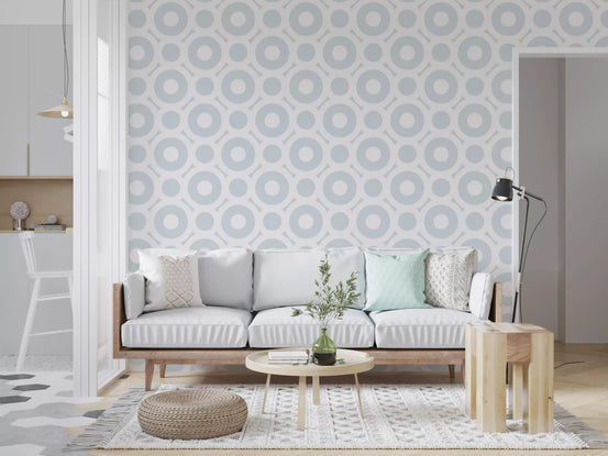 Contemporary circles wallpaper of blue-grey rings behind a living room GD11980