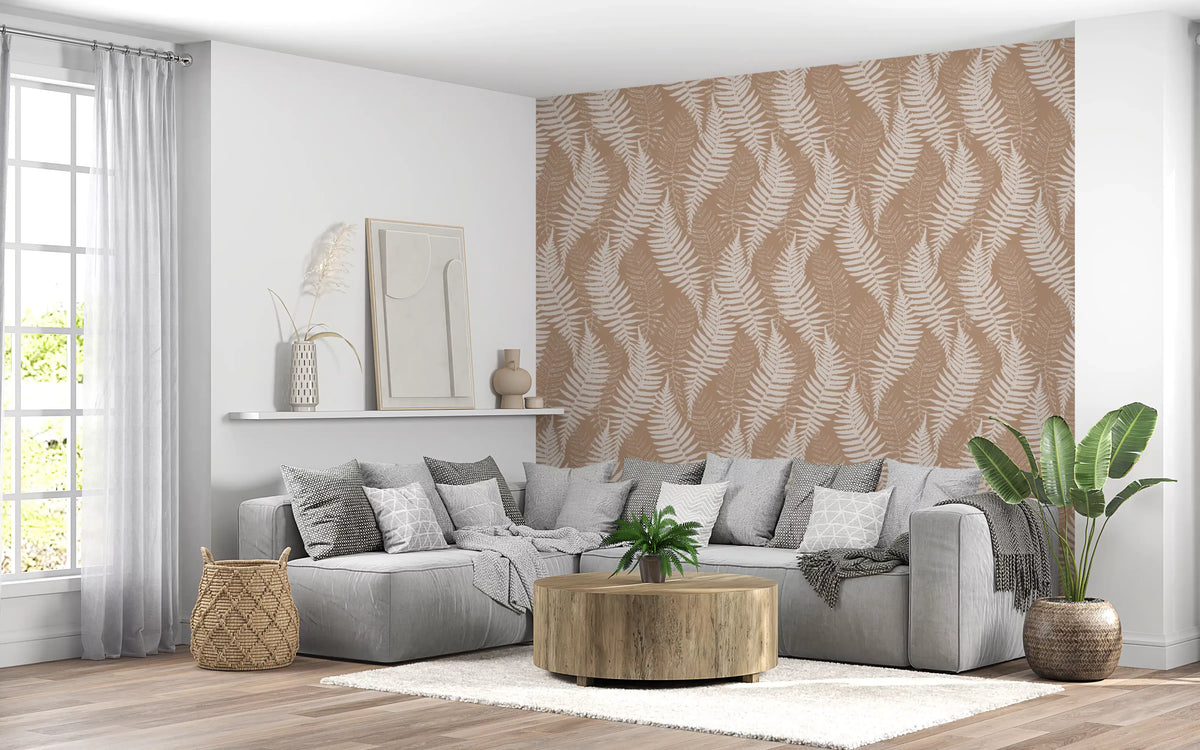 Rustic fern wallpaper behind a grey sectional sofa and wood drum coffee table GD12260