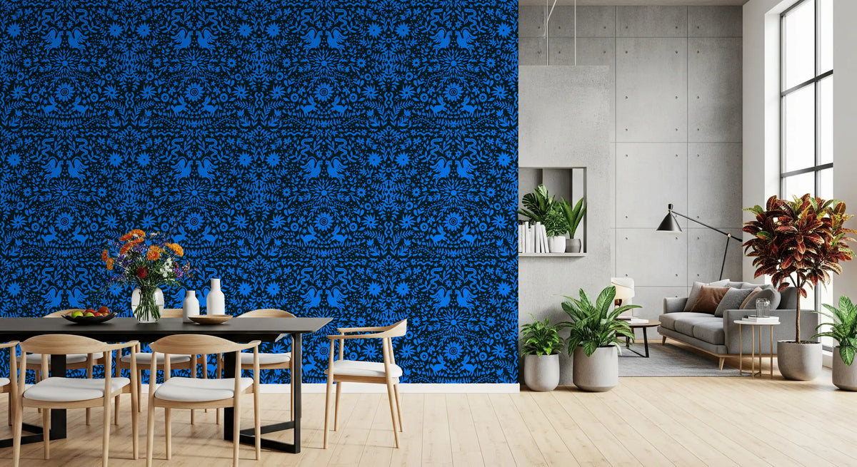 Blue folk art wall in a dining room with a black table and wood chairs GD12263