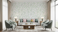 Greenery wallpaper in a lounge with sage wingback chairs and a grey sofa GD12282