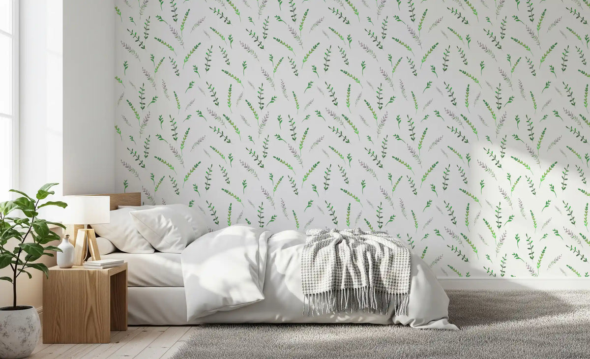 Green leaf wallpaper in a bedroom with a white bed and chunky knit throw GD12282