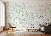 Greenery wallpaper in a living room with a grey sofa and wooden accent chair GD12282