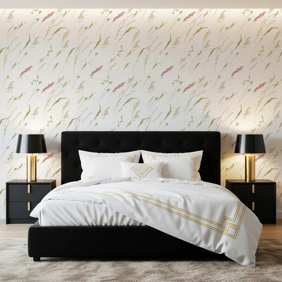 Meadow sprigs wallpaper behind a black upholstered bed framed by gold table lamps GD12292