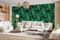 Green palm leaf wallpaper wrapping a lounge with a white sofa and wooden shelving GD12296