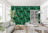 Tropical palm leaf wallpaper in a dining nook with a grey hutch and a set white table GD12296
