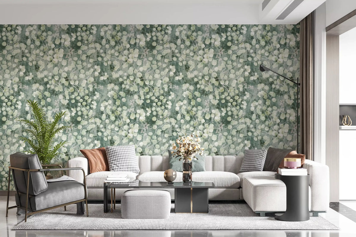 Cream sofa and armchair with poufs framed by eucalyptus brushstroke wallpaper GD12324