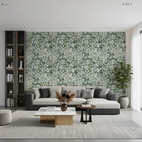 Spacious living room grey sectional and bookshelves with eucalyptus mist feature wallpaper GD12324