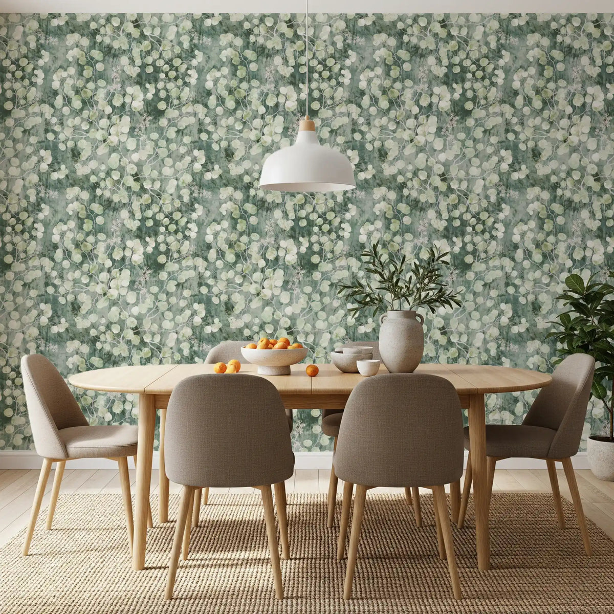 Wooden dining table and taupe chairs on jute rug against eucalyptus mist wallpaper GD12324