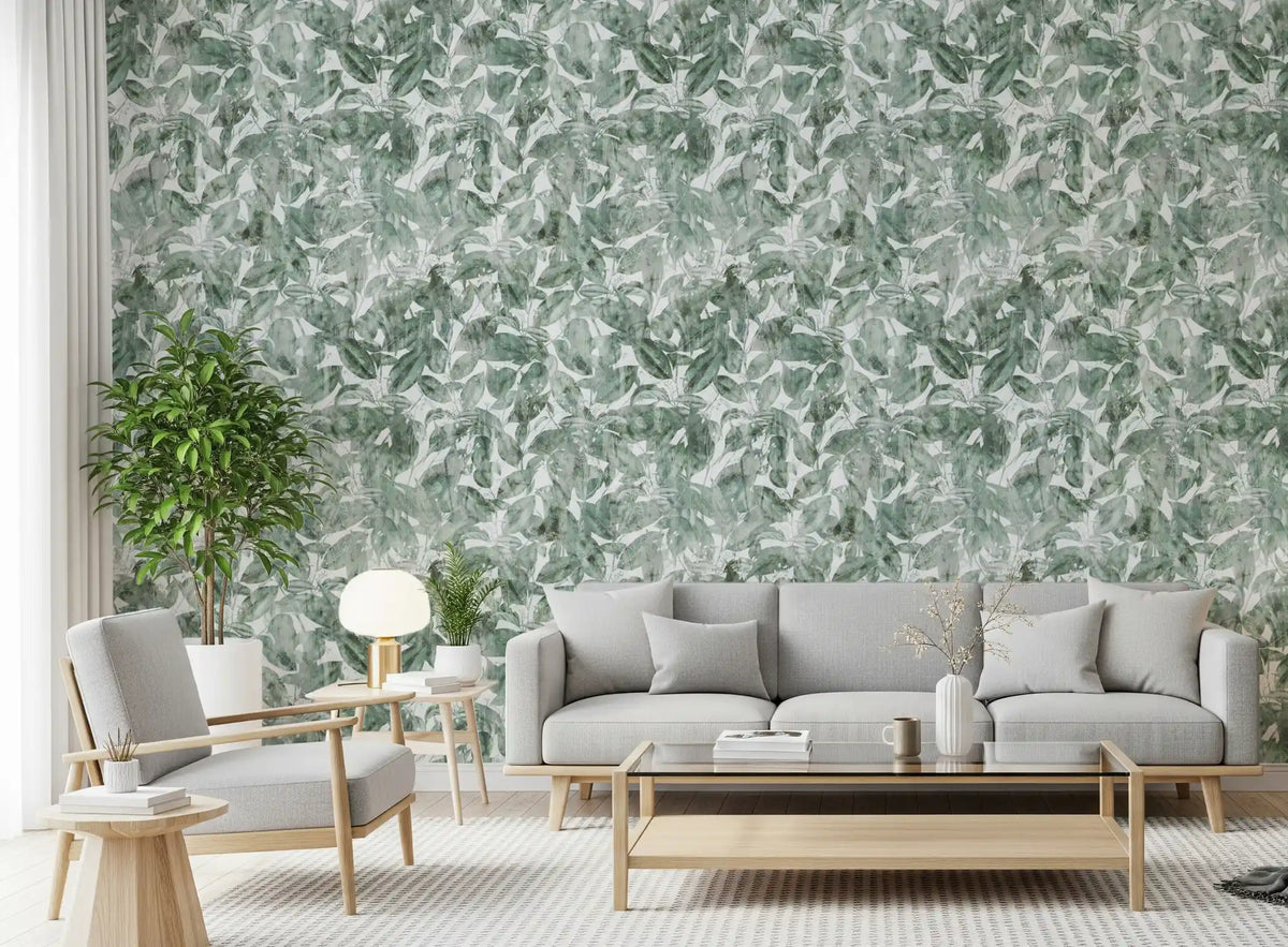 Grey sofa and armchairs with leafy plant against misty forest leaf canopy wallpaper GD12325