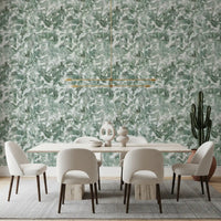 White dining set under brass linear chandelier with green leaf canopy wallpaper GD12325
