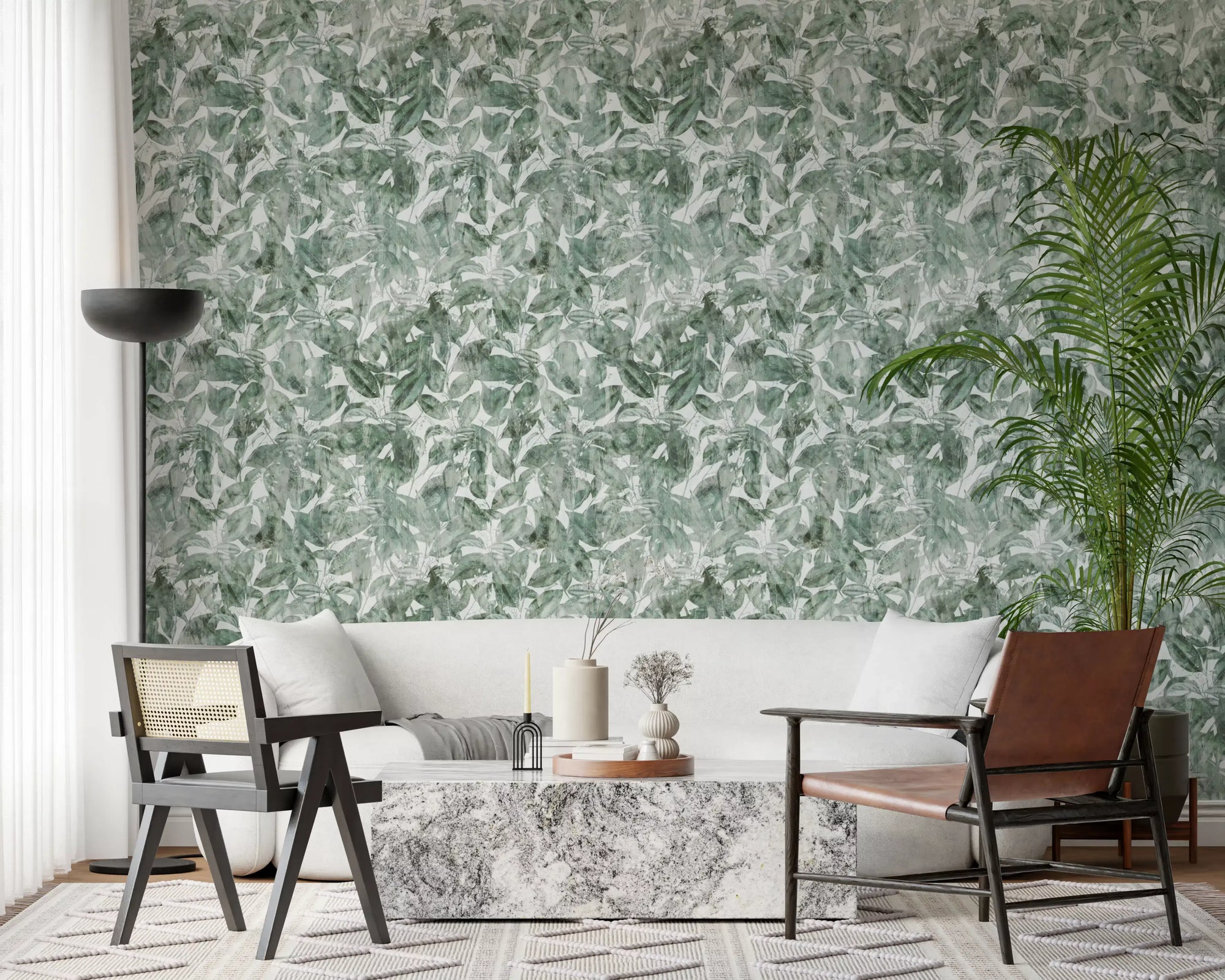 White sofa cane and leather chairs with marble table on sage botanical forest print wallpaper GD12326