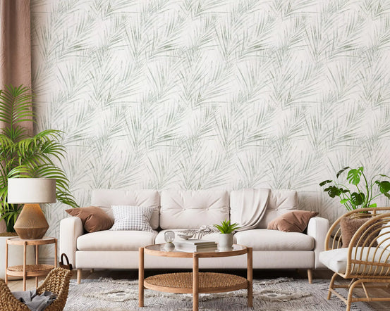 Cream sofa and rattan chair with wood tables against sage palm botanical sketch wallpaper GD12327