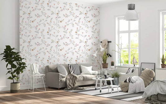 Dainty pastel floral wallpaper in a bright living room with a grey sofa and leafy potted plants GD12433
