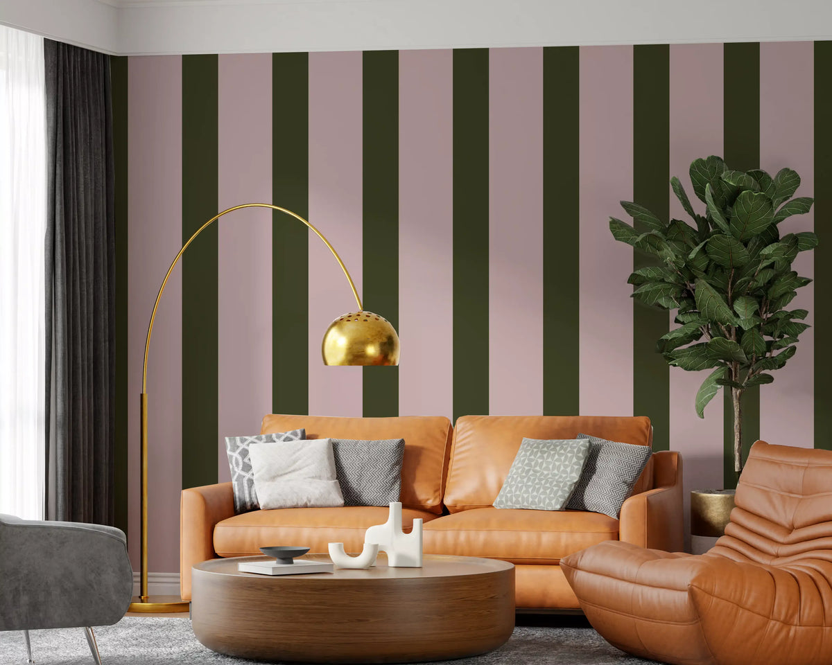Olive green and dusty rose stripe wallpaper behind a tan leather sofa with a gold arc lamp GD12438