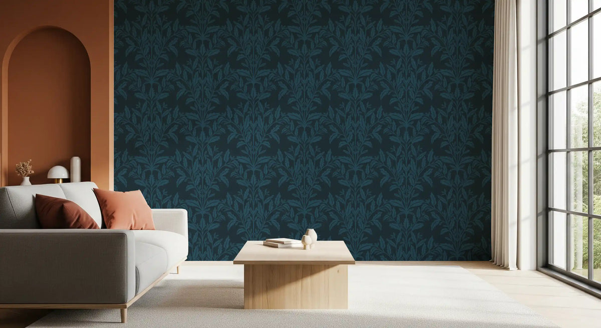 Enchanted ink leaf motif wallpaper behind a grey sofa near an arched terracotta doorway GD12456