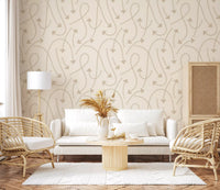 Cream geometric wallpaper in a living room with white sofa and rattan armchairs GD12457