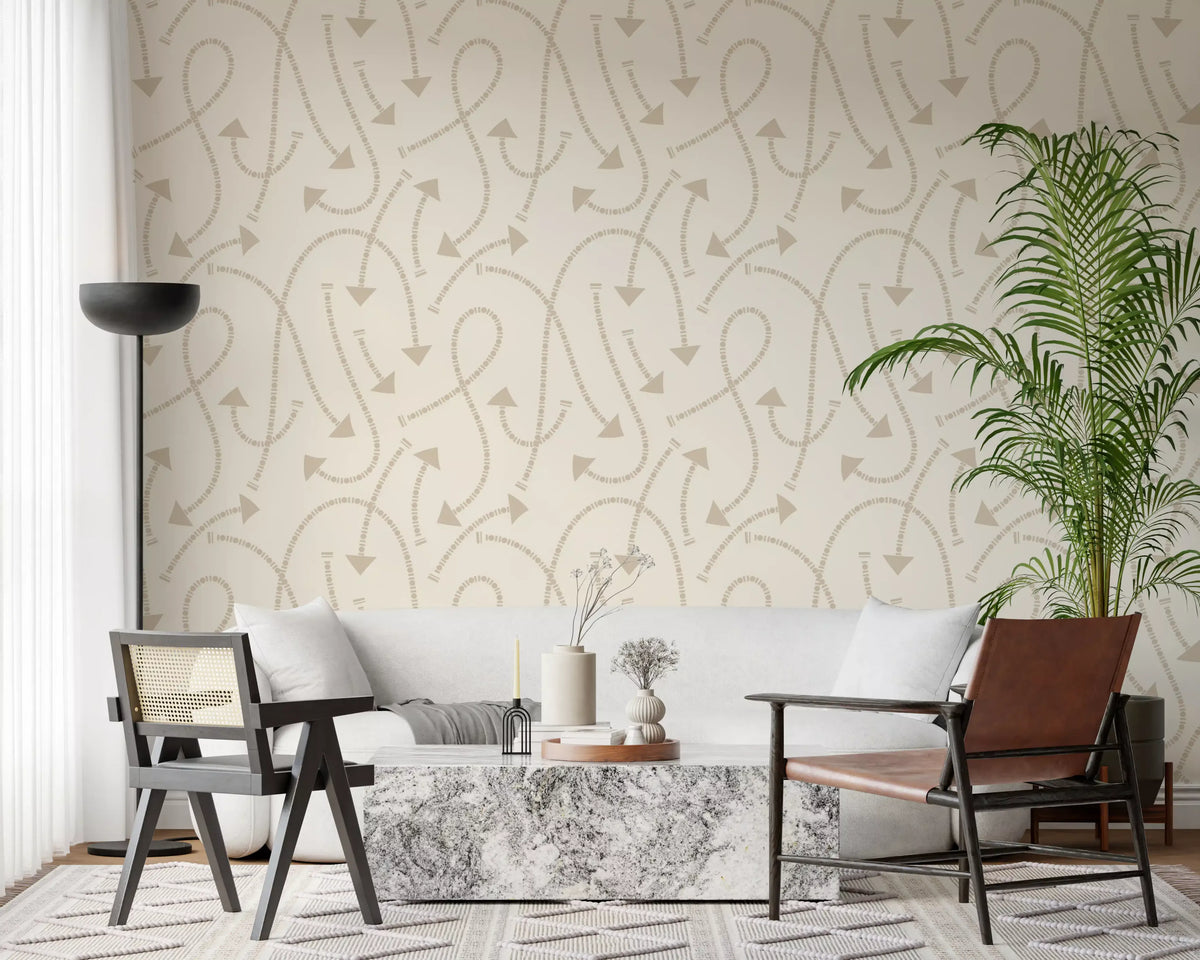 Cream geometric path wallpaper behind a white sofa with palms and a leather chair GD12457