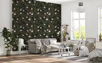 Dark charcoal floral wallpaper behind a grey sofa in a bright Scandinavian living room GD12467