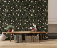 Charcoal floral wallpaper above a wooden console with vinyl records and a potted cactus GD12467