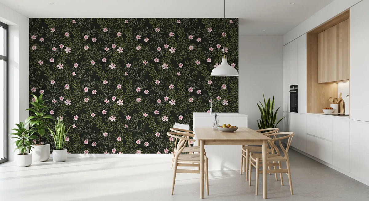 Charcoal floral wallpaper in a bright kitchen dining nook with a light wood table GD12467