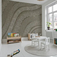 Taupe etched lines wallpaper in a kids playroom with wood play table and toy train GD12471