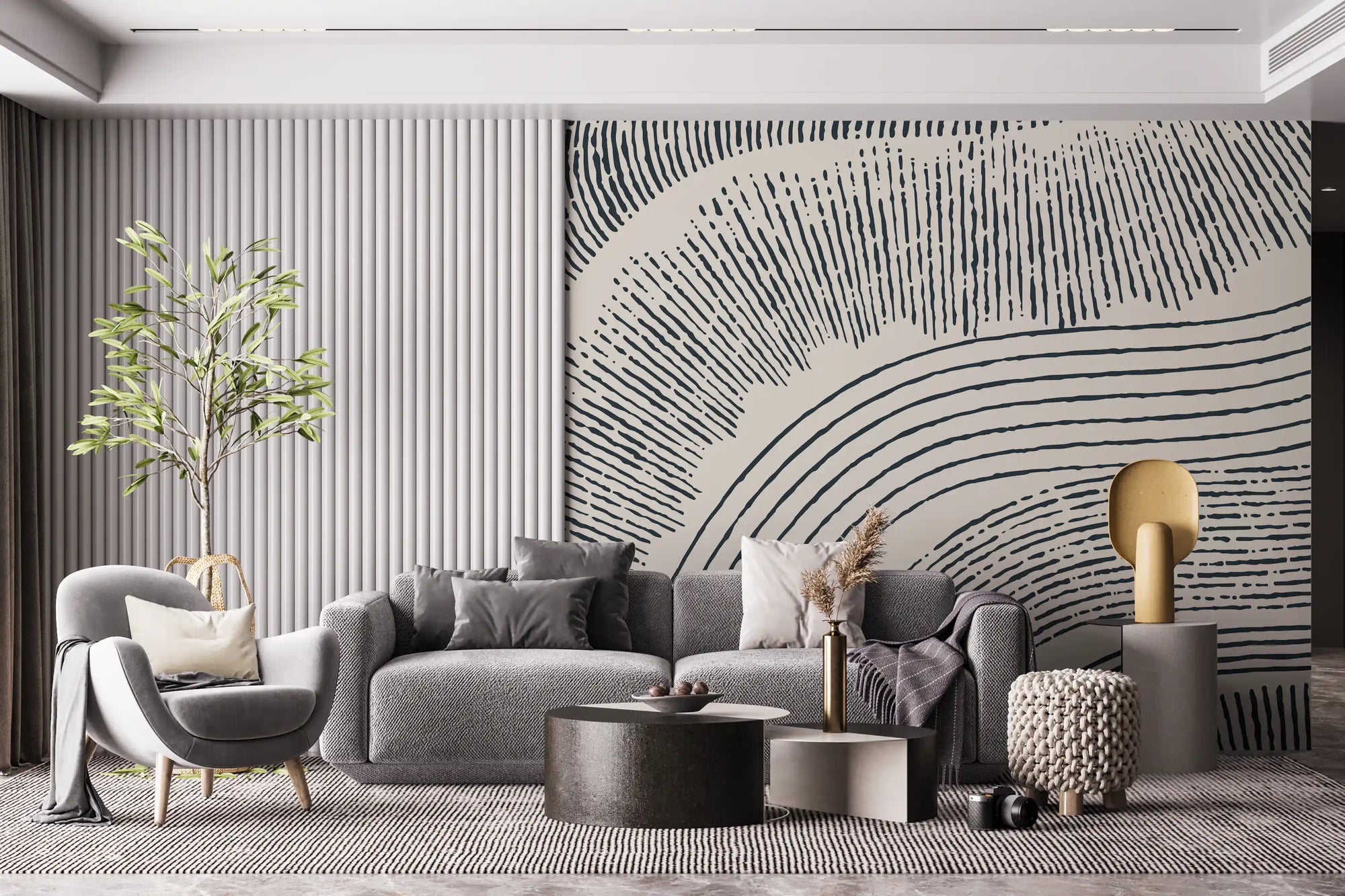 Charcoal rippled texture mural behind a grey sofa with cream accent chair and olive tree GD12472