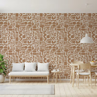Abstract shapes wallpaper behind a white bench sofa and wood dining set GD12478