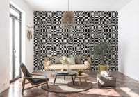 Abstract ink grid mural wallpaper in a sunlit corner with black lounge chair GD12488