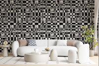 Abstract ink grid mural wallpaper behind a white curved sofa and ottomans GD12488