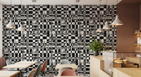 Black and white abstract grid wallpaper in a cafe with terracotta accent GD12488