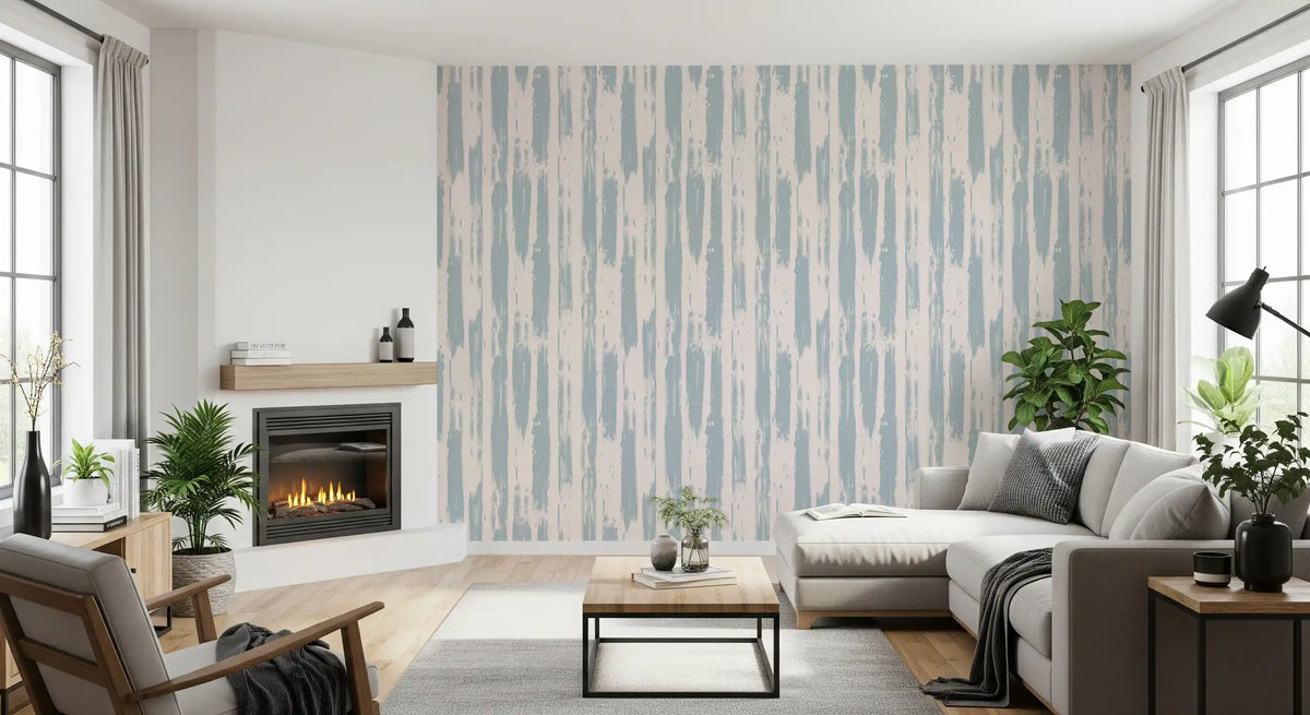 Nordic painted stripe wallpaper by a fireplace with grey sectional and plants GD12490