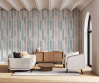 Nordic painted stripe wallpaper behind a cream sofa and wood sideboard GD12490