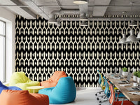 Colourful bean bags in a breakout office with black and cream diamond wallpaper GD12494