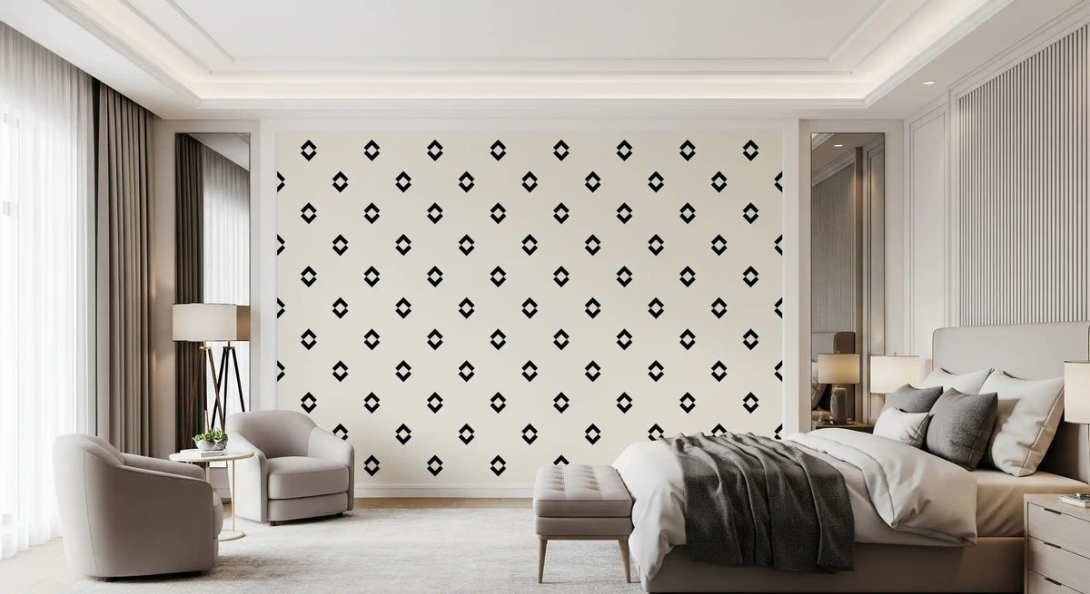 Black and white diamond wallpaper in a bedroom with a grey bed and armchair GD12502