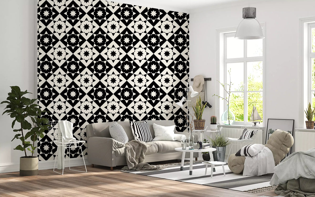 Black and cream geometric wallpaper in a bright living room with a grey sofa GD12503