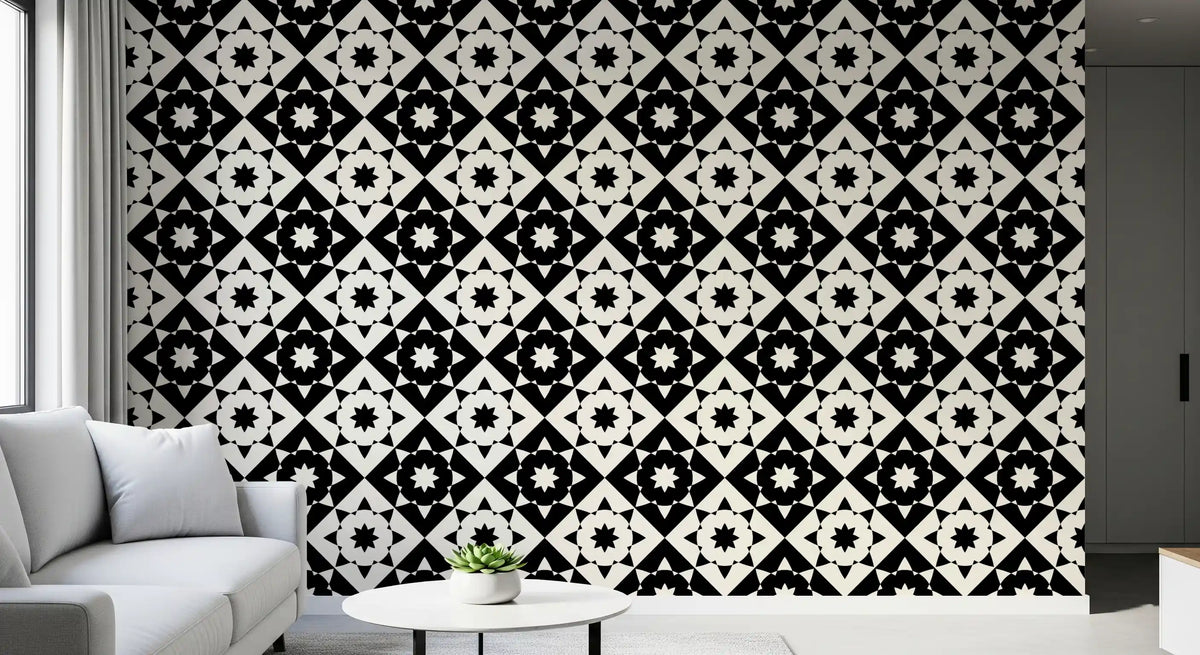 Geometric starburst wallpaper close up behind a white sofa and round side table GD12503