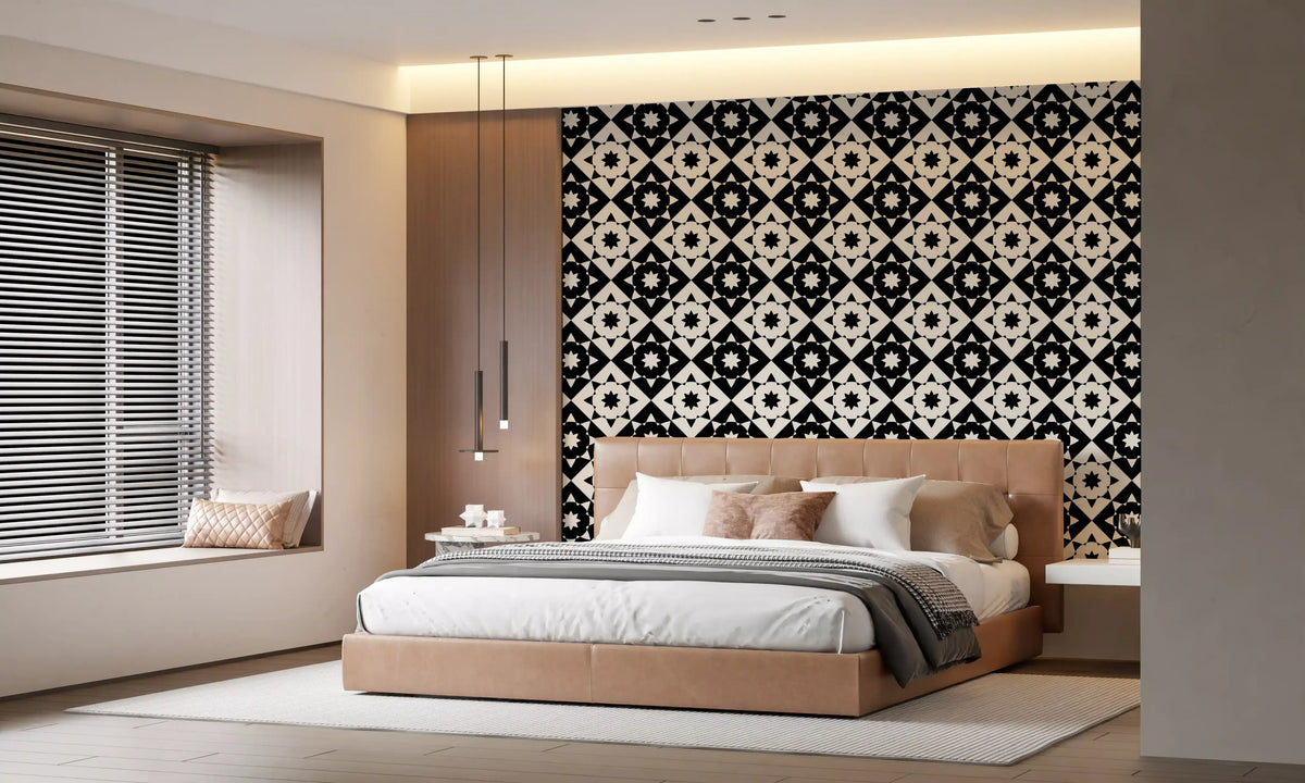 Starburst motif wallpaper behind a tan upholstered bed near window blinds GD12503