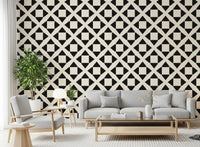 Black and white diamond grid wallpaper in a lounge with a grey sofa GD12504