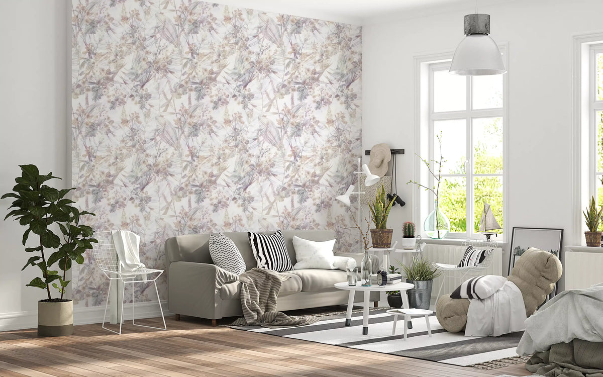 Watercolour floral wallpaper behind a cream sofa with layered rugs and a plant GD12505