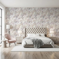 Ethereal meadow botanical wallpaper in a bedroom with a tufted bed and pink chair GD12505