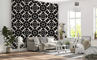 Black and cream circle grid wallpaper in a bright living room with a white sofa GD12506