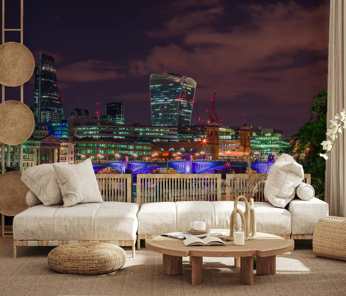 Thames night cityscape mural behind a cream boucle sofa and round wood table GD12625