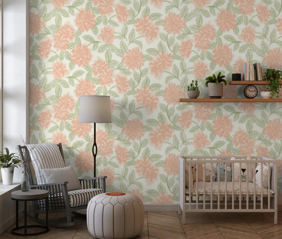 Sage and peach botanical wallpaper in a nursery with a crib and grey armchair GD12646