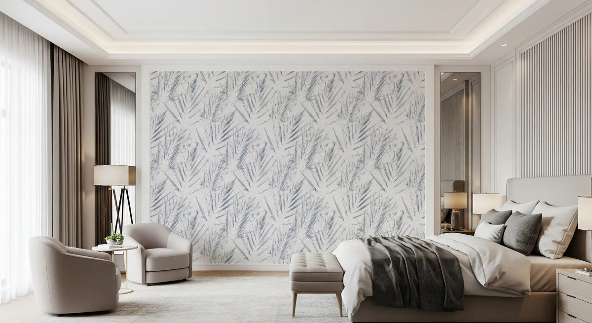 Textured palm foliage wallpaper behind an upholstered bed and beige armchair in a bedroom GD12683